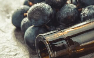 grapes and wine bottle