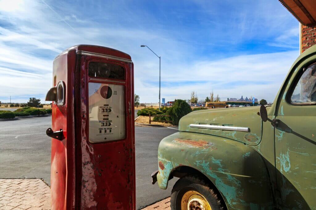 Vintage rusty truck on gas station somewhere in USA